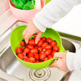 Thick drain basket rice bowl with handle, kitchen essential.